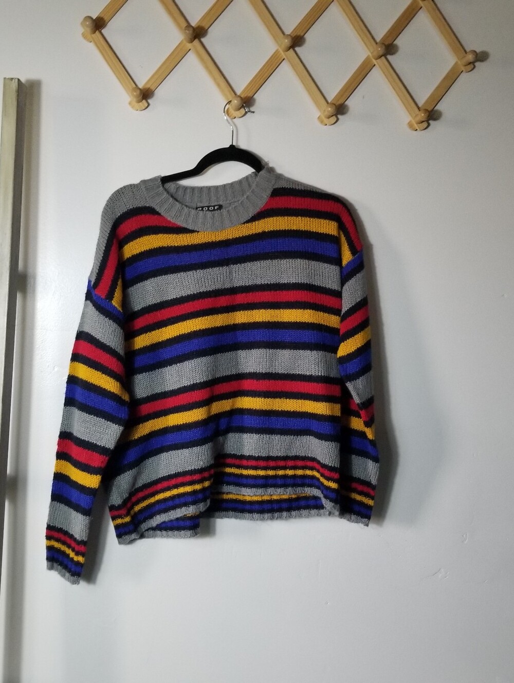 POOF NEW YORK WONEN'S GRAY WITH RED, BLUE, AND YELLOW SWEATER SIZE MEDIUM